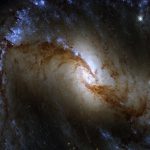 Survey of the Stars: Hubble Captures Great Barred Spiral Galaxy in a Fiery Furnace